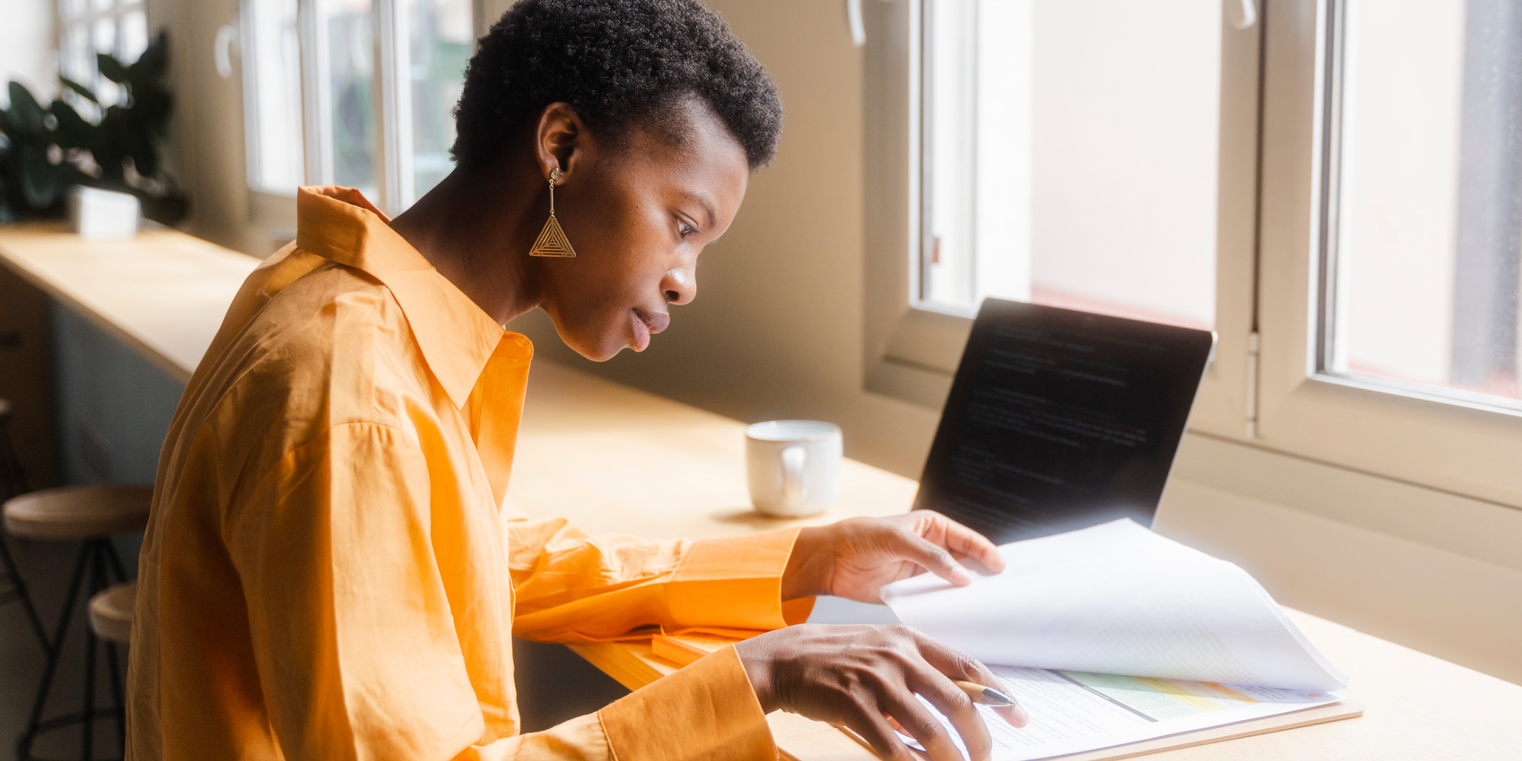 Woman looking over documents. 
